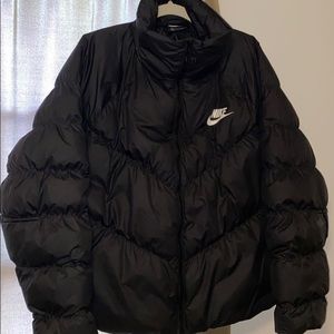 black Nike puffy jacket